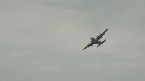 Air Force Lockheed C-130H Hercules perform a demonstration flight at BIAS 2024. Video stock 302454989