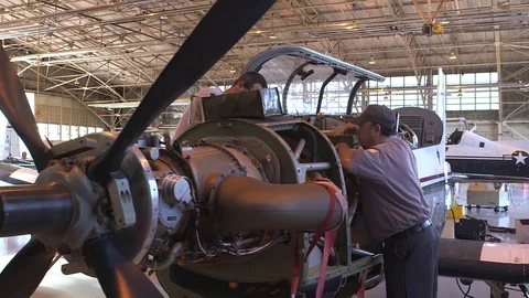 Air Force Mechanics Work On T-6 Texan Aircraft 05 Video stock 127995345