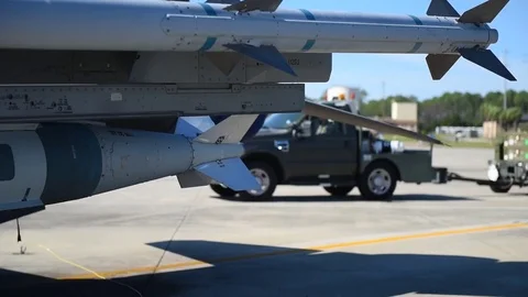 Air Force Munitions being delivered for building and loading program with F-16 Stock Footage 83310140