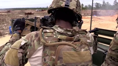 Air Force, Soldier Shoots a Machine Gun at a target Stock Footage 121891379