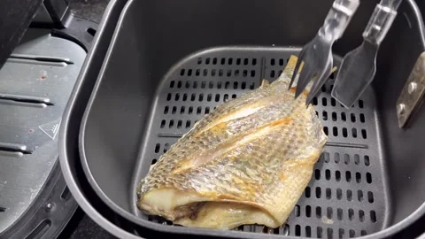 Air-fried tilapia2 Stock Footage 338278380
