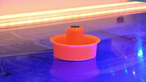 Air hockey game Stock Footage 76877684