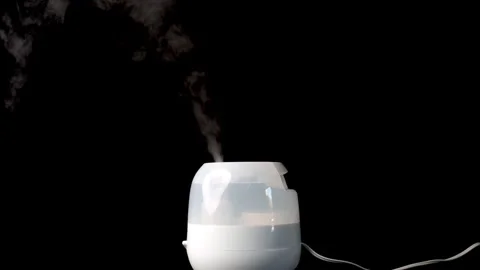 Air humidifier creating steam.  Stock Footage 297494216