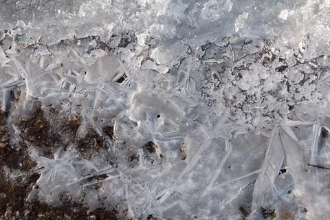 Air ice with an openwork pattern formed on the surface during frosts Stock Photos