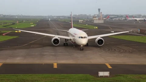 Air India Boeing 787 Dreamliner taxiing for takeoff at Mumbai Airport Stock Footage 208091446