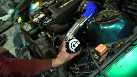 Air intake system on a drift car with a turbo engine Stockbeeldmateriaal 235680038