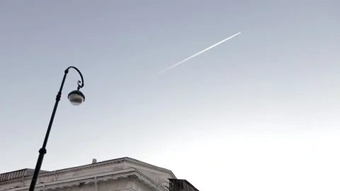 Air jet trail in the sky Stock Footage 144728056