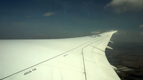 Air plane window shot of jet wing Stock Footage 108736483