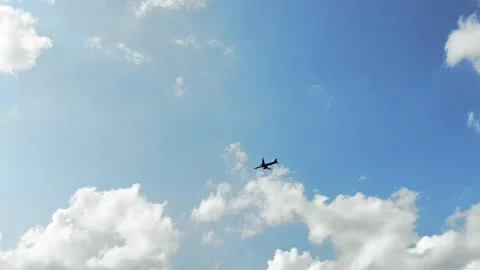 Air plane window view time lapse clouds and blue sunny sky, Loop of white clouds Video stock 250252140
