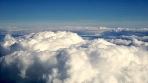 Air plane window view time lapse clouds and blue sunny sky 스톡 동영상 262120050