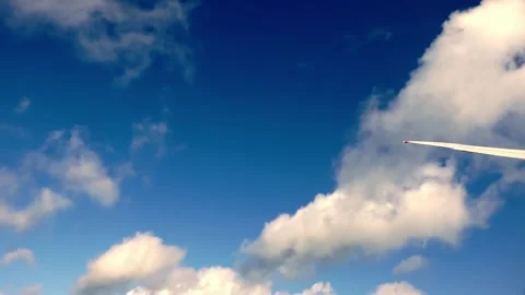 Air plane window view time lapse clouds and blue sunny sky 스톡 동영상 262120087