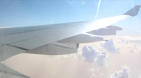 Air plane wing and clouds Stock Footage 46321729