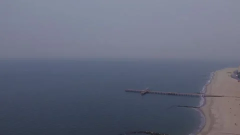 Air Pollution From Canada Wildfire in New York, Brooklyn, Coney Island Stock Footage 243193596