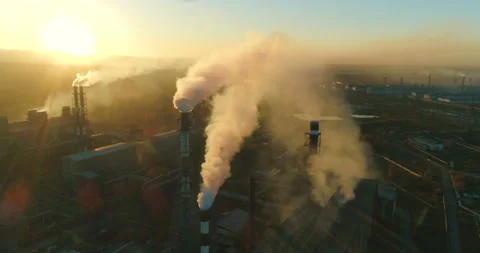 Air pollution. clouds of smoke coming from the chimneys of the plant with Stock Footage 108432938