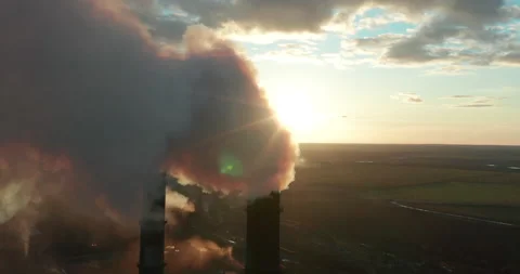 Air pollution. clouds of smoke coming from the chimneys of the plant. Drone Vídeo Stock 137838778