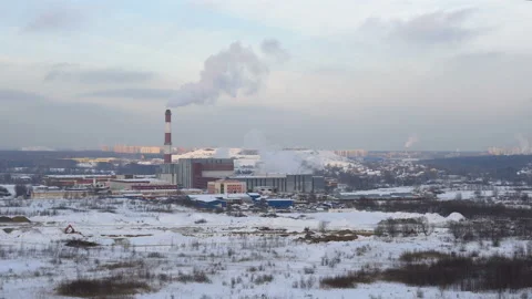Air pollution from a factory pipe on a winter afternoon Stock Footage 101095511