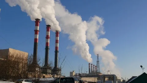 Air Pollution From Industrial Plants. Red with white pipe. Stock Footage