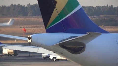 Air pollution from jet engine driving in reverse on Airport Stock Footage 119502153