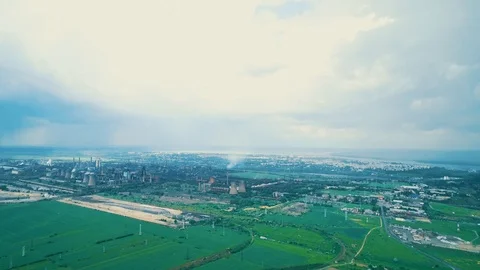 Air pollution problem. An industrial territory with fabric pipes emitting dark Stock Footage 125481934