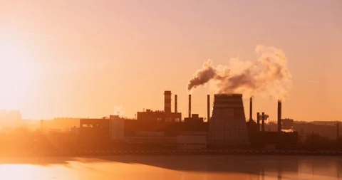 Air pollution at a refinery at sunset Stock Footage 98307728