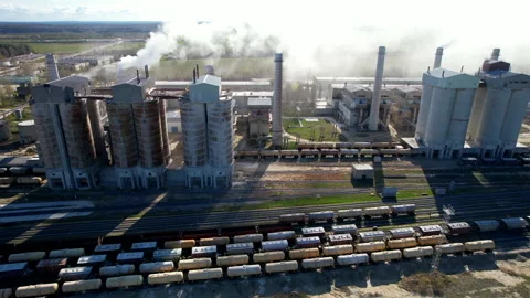 Air pollution. Smoke from pipes of cement plant. Сement Factory with smoke pipe. Stockbeeldmateriaal 194043653