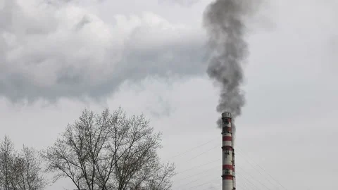 Air pollution - smokestack exhausting combustion gases into the air, aerial Stock Footage 159074776