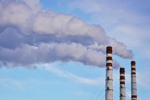Air pollution. Thick smoke from chimneys Stock Photos