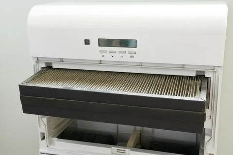Air purification system with dirty filter. Changing the filter. Stock Photos