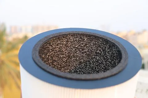 Air purifier filter element with visible activated carbon layer Stock Photos