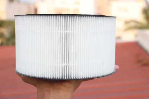 Air purifier filter replacement for small dc powered indoor air purification Stock Photos