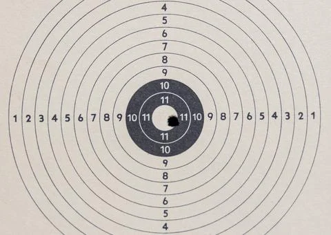 Air rifle target hit pattern Foto stock
