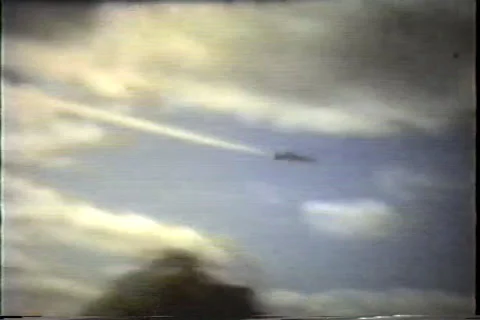 Air show single jet passes crowd, early 1960's Video stock 36086635