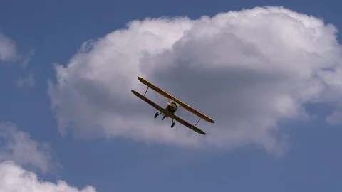 Air show, Stearman (Boeing) Model 75 is a biplane formerly used as a military Video stock 101047687