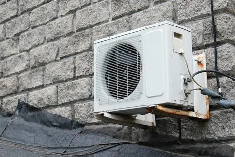 Air source heat pump installed in building. Sustainable and clean energy Fotos de archivo