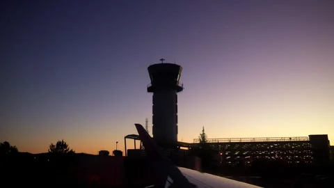 Air Traffic Control ATC tower at Tirana airport capital of Albania at sunset Stock Footage 337583748