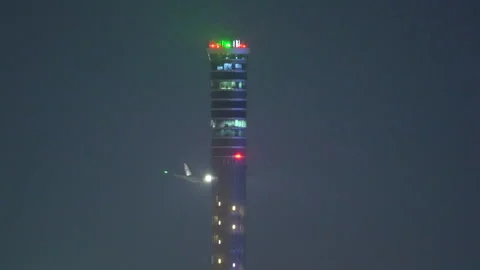Air traffic control tower in airport at night. Stock Footage 280508933