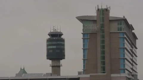 Air Traffic Control tower and hotel building in Vancouver airport. 库存影片 150605751