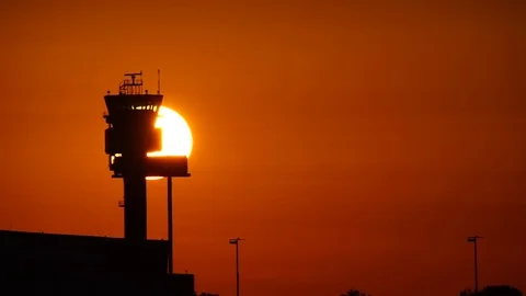 Air traffic control tower in sunset Stock Footage 81454374