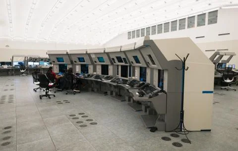 Air Traffic Controllers in air traffic control center with monitors and radar Stock Photos
