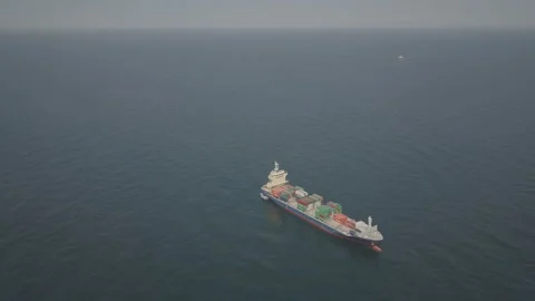 Air view of a cargo ship in the Persian Gulf off the coast of Saudi Arabia Stock Footage 145493871