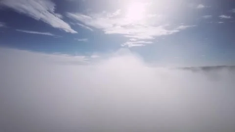 Air view. Flying low above the clouds on an unmanned fpv glider. Cloud surfing Stock Footage 255651631