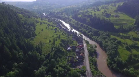 Air view. flying over the village by the river Stock Footage 64779727