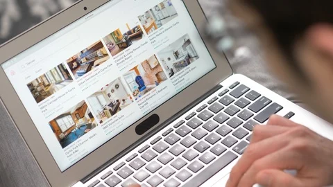 Airbnb Website on a Laptop Computer Display Being Browsed Stock Footage 105089905