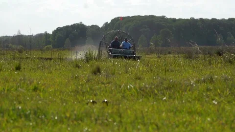 Airboat in field Stock Footage 98213890