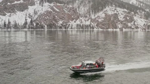 The airboat floats on the river Stock Footage 158697545