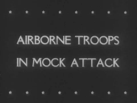 Airborne US troops undergo a mock attack for training purposes in 1942. Stock Footage 75189282