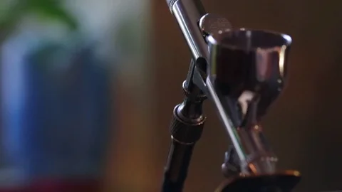 Airbrush on table close-up shot 库存影片 72212498