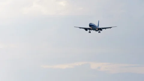 Airbus 321 approaching over ocean Stock Footage 122339847