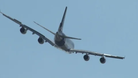 Airbus A-380 gracefully smoothly performing left turn with roll. Stock Footage 106967815