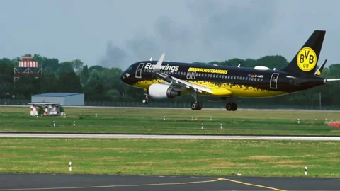Airbus A320 of Eurowings Airlines -Borussia Dortmund Livery- landing Stock Footage 85533338